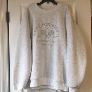 Grey crewneck. Brand new and not worn, tags taken off! Perfect condition!